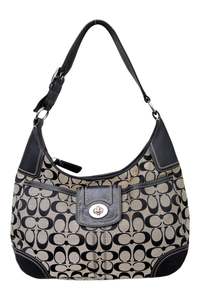 Accessories: #210 Coach Turn-Key Bag Black | c. 199 |