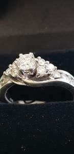 Products: A solitaire Diamond Ring in white Gold