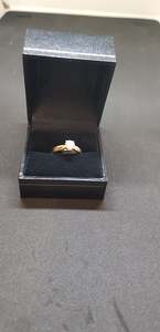 A solitaire Diamond Engagement Ring