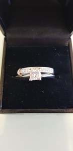 Products: An 18ct White Gold Wedding and Engagement Ring Set