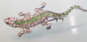 Products: A Diamond and Demantoid garnet lizard brooch