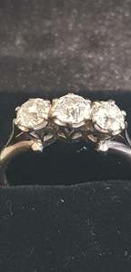 Products: A three Stones Diamond Ring