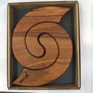 Home Living Collection: Rimu Koru Trivet with NZ Map Motif - Naturally Wood