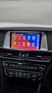 Car Stereo: KIA OPTIMA FACTORY STEREO REPLACED BY DERTON WIRELESS APPLE CARPLAY/ ANDROID AUTO MULTIMEDIA UNIT and Retained Factory Steering wheel control buttons/ Reverse Camera/ AC Heater information Display