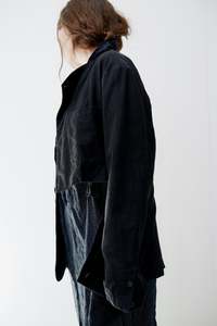 Fashion: Black buttoned jacket with half cut