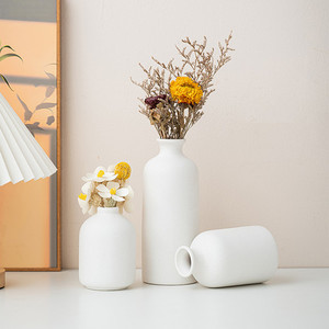 Products: White Ceramic Vases Puredeco