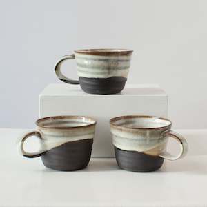 Helen Pearce: HP Mugs: black clay with white glaze
