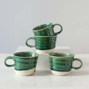 Helen Pearce: HP Mugs: White clay with green glaze