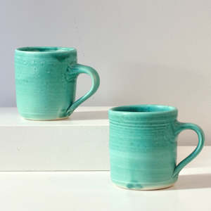 JLA: Turquoise mugs