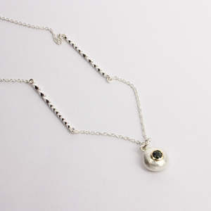 Necklaces: RMO70: Green sapphire pebble pendant