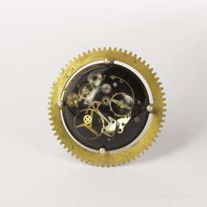 JA78: Cog brooch
