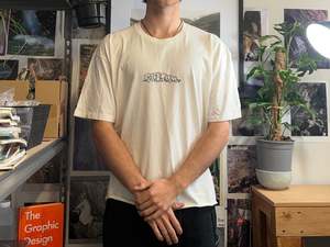 T Shirts: Cream T shirt