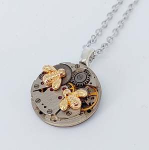 Bestseller - Mini timepiece pendant with tiny golden bees
