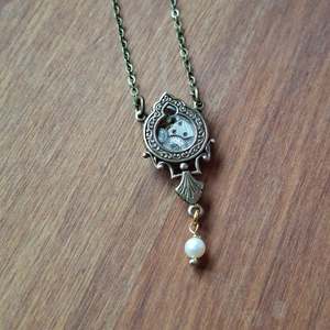 New Season Styles: NEW! Brass Timepiece Ornate Window Pendant with Pearl