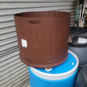 Products: WATER TUB OR GARDEN PLANTER. BROWN. 100 LITRE. WITH HAND GRIP. - RainHarvest and Services