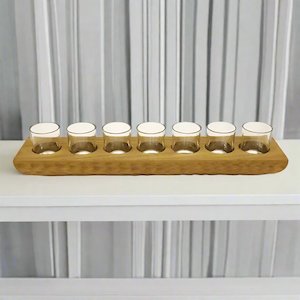 Stoneligh Roberson: CARVED WOOD TEALIGHT HOLDER