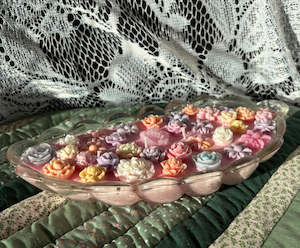 Glass feather candle