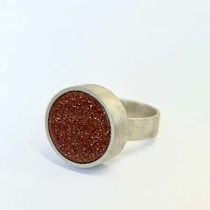 Goldstone and sterling silver ring