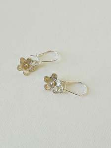 Carved flower sterling silver earrings