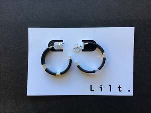 Black White Exhibition: Silver hoop earrings with fused rubber in medium