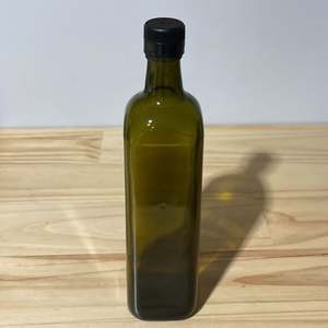 Containers: 750ml Marasca Antique Green Bottle with Black Pourer lid 0.47kg