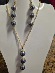 Earrings: Pearl earrings and necklace set