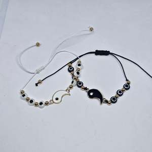 Under 10: Yin Yang Wax Cord Bracelet