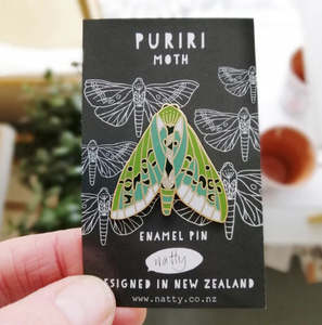 Frontpage: Puriri Moth Enamel Pin by Natty