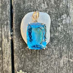 9ct gold: Huge Swiss blue topaz pendant