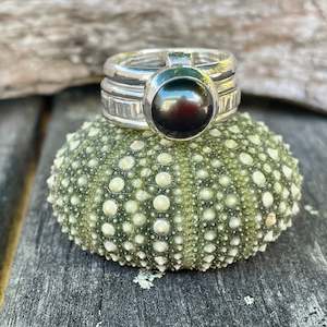 Spinner And Unity Rings: Peacock freshwater pearl Unity ring