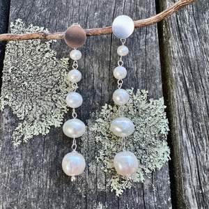 Pearls: 5 tier graduated white freshwater pearl earrings