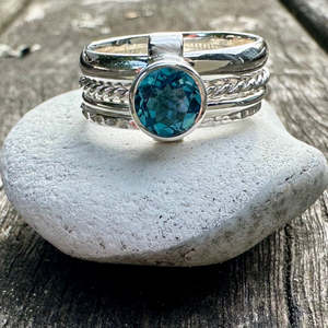 Spinner And Unity Rings: swiss blue topaz fine unity ring