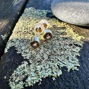 Pink sapphire studs