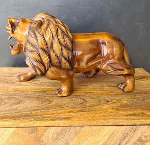 WOODEN LION STATUE