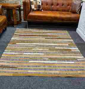 Country Chesterfield: Rihanna goat Hide Rug