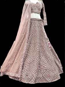 Womens: (Video clip attached )size 40 (upto 44)fully stitched Dusky Pink color heavy embroidery with stones & sequined with Mirror work multiflared very heavy lehnga with heavy work design in blouse and embroidery dupatta