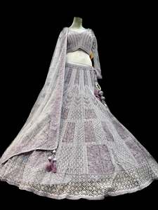 Womens: (Video clip attach)size 42 (upto 44)fully stitched Lavender color engagement /semi bridal lehnga with full of stones & embroidery work heavy multi flared and with very heavy embroidery work netting dupatta and blouse piece