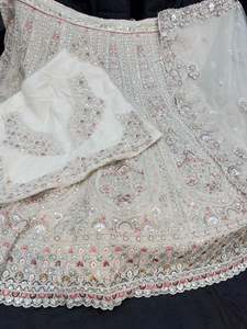 Womens: Video clip attached )Party wear cream color heavy sequined and maroon color embroidery work multiflared very heavy lehnga with heavy work design in blouse and embroidery dupatta (Unstitched Lehnga)