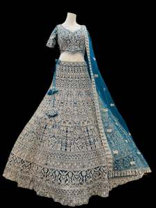 Womens: (Video clip attach)size 40 (upto42)fully stitched Hot Pink color engagement /semi bridal lehnga with full of stones & embroidery and Mirror work all over heavy multi flared and Mirror work netting dupatta and stylish blouse