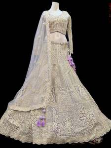 Womens: (Video clip attach)size 38 upto 40)fully stitched Purple lavender color engagement /semi bridal lehnga with full of stones & embroidery work heavy multi flared and with very heavy embroidery work netting dupatta and blouse piece