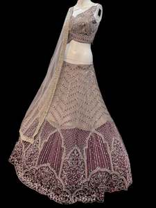 Womens: (Video clip attach)size 38(upto 40)fully stitched wine color engagement /semi bridal lehnga with full of embroidery and Mirror work all over heavy multi flared and hand work netting heavy dupatta and stylish blouse