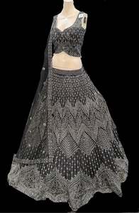 Womens: (Video clip attach)size 40(upto 44) fully stitched Black color Partywear lehnga with full of embroidery, stones and Mirror work all over heavy multi flared and hand work netting heavy dupatta and stylish blouse