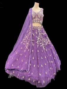 Womens: (Video clip attach)size 38(upto 40) fully stitched Lite Grey Silver color Partywear lehnga with full of embroidery, stones and Mirror work all over heavy multi flared and hand work netting heavy dupatta and stylish blouse