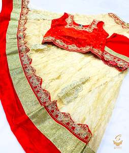 Kids: Red colour velvet based blouse with golden colour netting beautiful lehnga