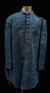 Indo Western: Plus size peacock Teal color based heavy embroidery & sequined work all over with hand work pearl beaded neck, buttons and sleeves design Sherwani and black Pants