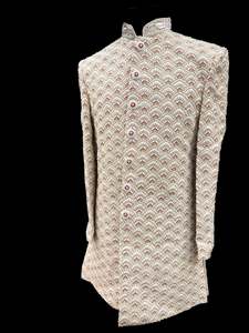 Indo Western: (Video clip attached )Cream based maroon color heavy embroidery & pearl sequined work all over with hand work pearl beaded neck, buttons and sleeves design Sherwani and Pants