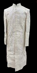 Indo Western: (Video clip attached )Cream color heavy embroidery work all over with hand work pearl beaded neck, buttons and sleeves design Sherwani and Pants