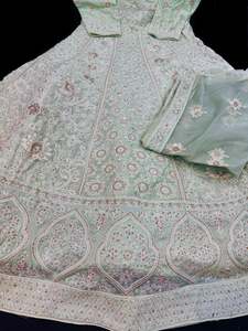 Ladies Suits Gowns: (Video clip attached)Chiffon georgette Based bridal style heavy design stones work With heavy embroidery Work at front and back Designer Flared Kameez /Gown And netting Based Embroidery Work heavy Dupatta