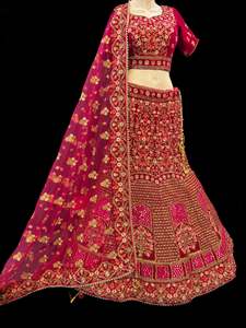 Crop Top: (Video clip attach)size 42(upto 46) fully stitched Hot Pink color full of embroidery and stones work blouse and all over heavy multi flared bridal wear lehnga with heavy work dupatta