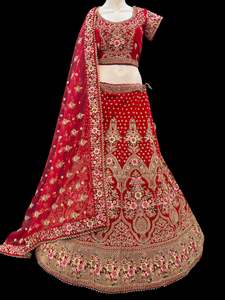 Crop Top: (Video clip attach)size 42(upto 46) fully stitched Red color full of embroidery and stones work blouse and all over heavy multi flared bridal wear lehnga with heavy work dupatta
